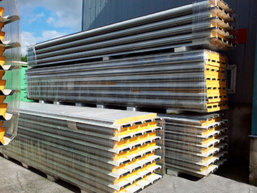 Sandwich panels in front of warehouse